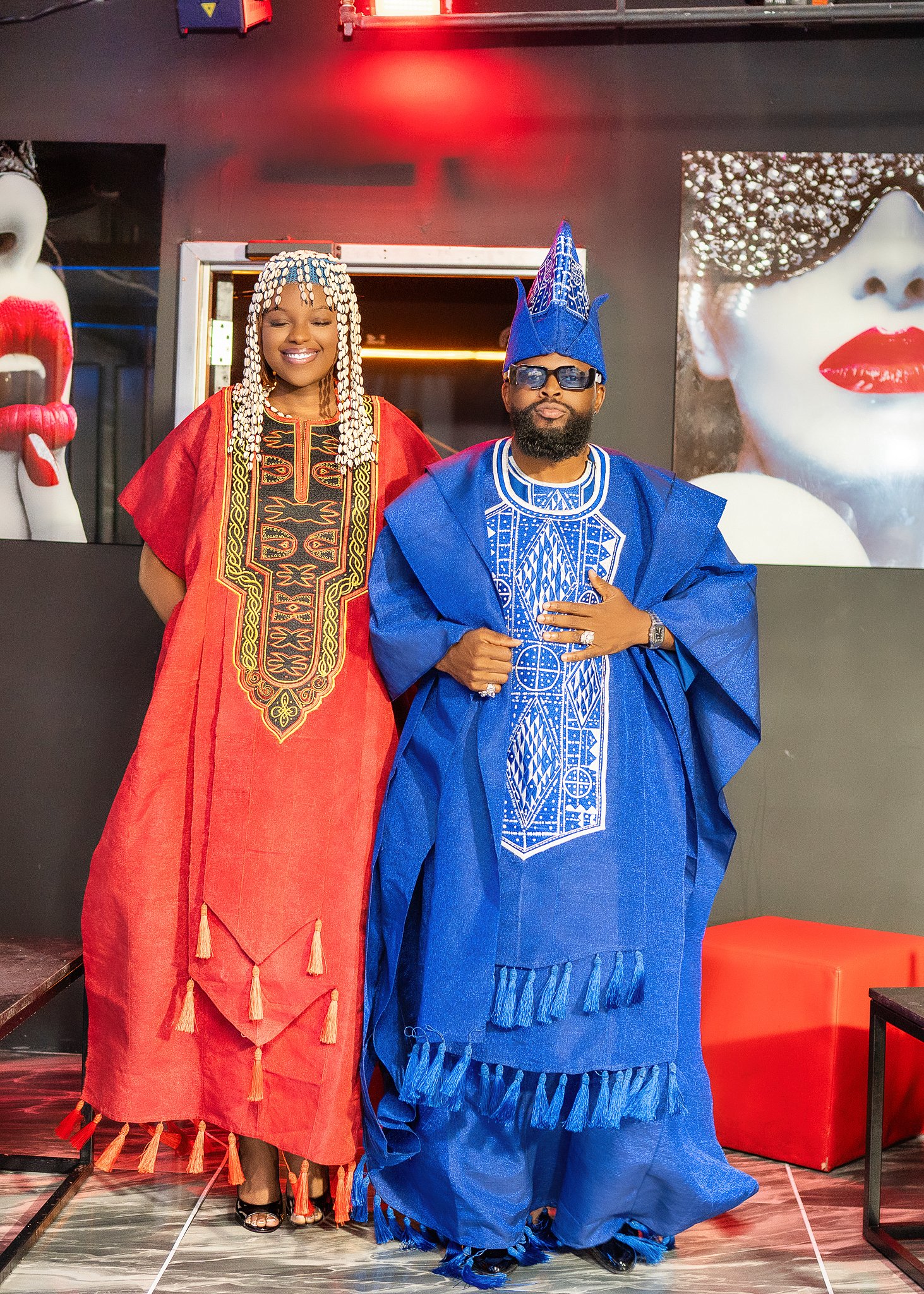 Couple in a red boubou and blue agbada